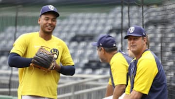 Aug 14, 2021; Pittsburgh, Pennsylvania, USA; Milwaukee Brewers relief pitcher Miguel Sanchez (left) talks with bullpen coach Steve Karsay (right) on the field before playing the Pittsburgh Pirates at PNC Park. Mandatory Credit: Charles LeClaire-USA TODAY Sports