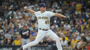 Aug 21, 2021; Milwaukee, Wisconsin, USA; Milwaukee Brewers relief pitcher Brad Boxberger (45) delivers a pitch against the Washington Nationals in the sixth inning at American Family Field. Mandatory Credit: Michael McLoone-USA TODAY Sports