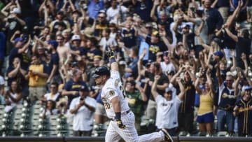 Sep 5, 2021; Milwaukee, Wisconsin, USA; Milwaukee Brewers first baseman Daniel Vogelbach (20) reacts after hitting a grand slam home run in the ninth inning to beat the St. Louis Cardinals at American Family Field. Mandatory Credit: Benny Sieu-USA TODAY Sports
