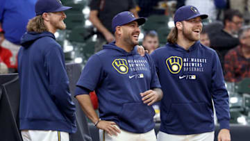 Milwaukee Brewers players, from left, Josh Hader, Omar Narvaez and Corbin Burnes, watch the video board highlights of their no-hitter as they were honored on Thursday, Sept. 23, 2021, for completing the second no-hitter in franchise history. Burnes and Hader accomplished the feat against Cleveland Sept. 11.Mjs Brewers Cardinals Brewers24 02722