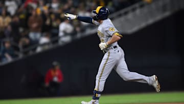 May 24, 2022; San Diego, California, USA; Milwaukee Brewers right fielder Tyrone Taylor (15) gestures as he rounds the bases after hitting a three-run home run during the sixth inning against the San Diego Padres at Petco Park. Mandatory Credit: Orlando Ramirez-USA TODAY Sports