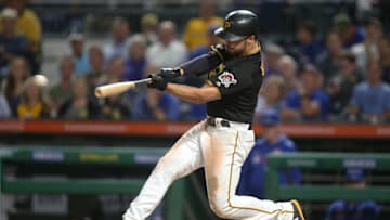 Sep 24, 2019; Pittsburgh, PA, USA; Pittsburgh Pirates right fielder Kevin Kramer (44) hits a two run double against the Chicago Cubs during the seventh inning at PNC Park. Mandatory Credit: Charles LeClaire-USA TODAY Sports