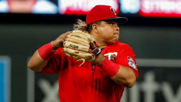 Sep 14, 2021; Minneapolis, Minnesota, USA; Minnesota Twins third baseman Willians Astudillo (64) fields a ball hit by Cleveland Indians center fielder Myles Straw (not pictured) to end the game at Target Field. Mandatory Credit: Bruce Kluckhohn-USA TODAY Sports