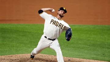 Oct 8, 2020; Arlington, Texas, USA; San Diego Padres relief pitcher Trevor Rosenthal (47), the eleventh pitcher for the team in the game, pitches against the Los Angeles Dodgers during the ninth inning during game three of the 2020 NLDS at Globe Life Field. Mandatory Credit: Kevin Jairaj-USA TODAY Sports
