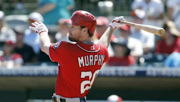 Mar 15, 2016; Kissimmee, FL, USA; Washington Nationals second baseman Daniel Murphy (20) hits a 2 run double during the third inning of a spring training baseball game against the Houston Astros at Osceola County Stadium. Mandatory Credit: Reinhold Matay-USA TODAY Sports