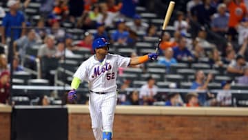 Aug 29, 2016; New York City, NY, USA; New York Mets left fielder Yoenis Cespedes (52) watches his walk off solo home run against the Miami Marlins during the tenth inning at Citi Field. Mandatory Credit: Brad Penner-USA TODAY Sports