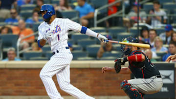 NEW YORK, NY - AUGUST 04: Amed Rosario #1 of the New York Mets hits a RBi ground ball to third base in the second inning against the Atlanta Braves at Citi Field on August 4, 2018 in the Flushing neighborhood of the Queens borough of New York City. (Photo by Mike Stobe/Getty Images)