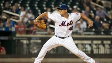 NEW YORK, NY - AUGUST 07: Jason Vargas #40 of the New York Mets pitches during the first inning against the Cincinnati Reds at Citi Field on August 7, 2018 in the Flushing neighborhood of the Queens borough of New York City. (Photo by Michael Owens/Getty Images)