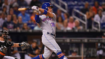 MIAMI, FL - AUGUST 10: Michael Conforto #30 of the New York Mets with a single for an rbi in the third inning against the Miami Marlins at Marlins Park on August 10, 2018 in Miami, Florida. (Photo by Mark Brown/Getty Images)