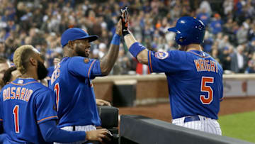 NEW YORK, NY - SEPTEMBER 28: Amed Rosario #1 and Jose Reyes #7 of the New York Mets greet teammate David Wright #5 after his pinch hit ground out during the fifth inning against the Miami Marlins at Citi Field on September 28, 2018 in the Flushing neighborhood of the Queens borough of New York City. (Photo by Jim McIsaac/Getty Images)