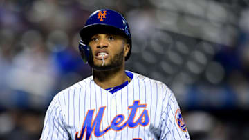 NEW YORK, NEW YORK - SEPTEMBER 26: Robinson Cano #24 of the New York Mets chews on gum before batting in the first inning of their game against the Miami Marlins at Citi Field on September 26, 2019 in the Flushing neighborhood of the Queens borough in New York City. (Photo by Emilee Chinn/Getty Images)