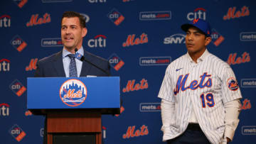 NEW YORK, NY - JANUARY 24: Luis Rojas, right, listens in as New York Mets General Manager Brodie Van Wagenen talks after being introduced as the team's new manager at Citi Field on January 24, 2020 in New York City. Listening in is the team's general manager . Rojas had been the Mets quality control coach and was tapped as a replacement after the newly hired Carlos Beltrán was implicated for his role as a player in 2017 in the Houston Astros sign-stealing scandal. (Photo by Rich Schultz/Getty Images)
