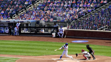 NEW YORK, NEW YORK - SEPTEMBER 06: Michael Conforto #30 of the New York Mets hits a double against the Philadelphia Phillies during the first inning at Citi Field on September 06, 2020 in New York City. (Photo by Steven Ryan/Getty Images)