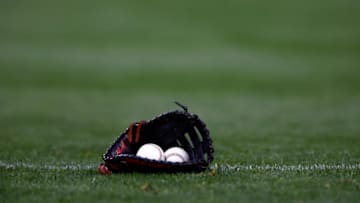 NEW YORK, NY - MAY 8: A baseball glove with baseballs are seen before the Arizona Diamondbacks take on the New York Mets at Citi Field on May 8, 2021 in the Flushing neighborhood of the Queens borough of New York City. (Photo by Adam Hunger/Getty Images)