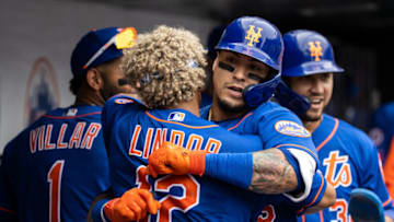 NEW YORK, NY - AUGUST 29: Javier Baez #23 of the New York Mets celebrates with Francisco Lindor #12 in the dugout after hitting a two run home run during the bottom of the fourth inning of a game against the Washington Nationals at Citi Field on August 29, 2021 in New York City. (Photo by Dustin Satloff/Getty Images)