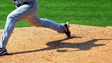 PHILADELPHIA, PA - APRIL 15: Mike Pelfrey of the New York Mets casts a shadow as he delivers a pitch against the Philadelphia Phillies in a MLB baseball game on April 15, 2012 at Citizens Bank Park in Philadelphia, Pennsylvania. To commemorate Jackie Robinson Day, all players and coaches wore #42. (Photo by Rich Schultz/Getty Images)