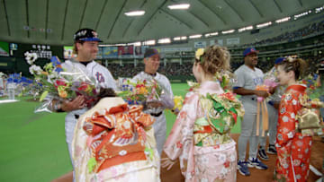 TOKYO, JAPAN - MARCH 30: (L) Mike Piazza and (R) Bobby Valentine of the New York Mets are greeted prior to the game against the Chicago Cubs at Tokyo Dome on March 30, 2003 in Tokyo, Japan. The Cubs won 5-3. (Photo by Getty Images)