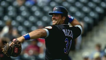 9 Mar 1999: Catcher Mike Piazza #31 of the New York Mets throws the ball before the Spring Training game against the Atlanta Braves at the Disney''s Wide World of Sports Complex in Kissimmee, Florida. The Mets defeated the Braves 9-3. Mandatory Credit: Andy Lyons /Allsport