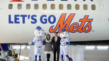 NEW YORK, NY - OCTOBER 06: (L-R) New York SVP of Delta Air Lines Gail Grimmett and COO of the New York Mets Jeff Wilpon pose with Mr. and Mrs. Met at Delta Air Lines' unveiling of the 'Let's Go Mets' aircraft at JFK Airport to celebrate the team's return to the postseason on October 6, 2015 in New York City (Photo by Brad Barket/Getty Lmages for Delta (Photo by Brad Barket/Getty Images for Delta)