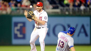 WASHINGTON, DC - MAY 23: Daniel Murphy #20 of the Washington Nationals bobbles the ball after forcing out Asdrubal Cabrera #13 of the New York Mets at second base in the fifth inning at Nationals Park on May 23, 2016 in Washington, DC. (Photo by Greg Fiume/Getty Images)