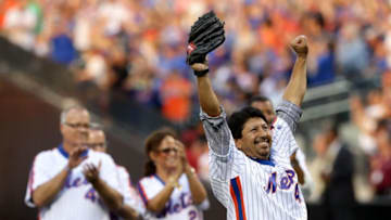 NEW YORK, NY - MAY 28: Jesse Orosco #47 of the 1986 New York Mets celebrates after he threw out the ceremonial first pitch before the game between the New York Mets and the Los Angeles Dodgers at Citi Field on May 28, 2016 in the Flushing neighborhood of the Queens borough of New York City.The New York Mets are honoring the 30th anniversary of the 1986 championship season. (Photo by Elsa/Getty Images)