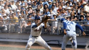 NEW YORK - CIRCA 1968: Jimmy McMath #24 of the Chicago Cubs is safe at first base beating the throw to Ed Kranepool #7 of the New York Mets during an Major League Baseball game circa 1968 at Shea Stadium in the Queens borough of New York City. Kranepool played for the Mets from 1962-79. (Photo by Focus on Sport/Getty Images)