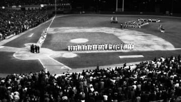 FLUSHING, NY - OCTOBER 16, 1973: The teams line up along the first and third basepaths prior to game three of the World Series on October 16, 1973 between the Oakland A's and the New York Mets at Shea Stadium in Flushing, New York. 73N3592 (Photo by: Olen Collection/Diamond Images/Getty Images)