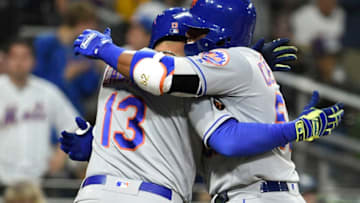 SAN DIEGO, CA - APRIL 28: Yoenis Cespedes #52 of the New York Mets, right, is congratulated by Asdrubal Cabrera #13 after hitting a two-run home run during the sixth inning of a baseball game against the San Diego Padres at PETCO Park on April 28, 2018 in San Diego, California. (Photo by Denis Poroy/Getty Images)