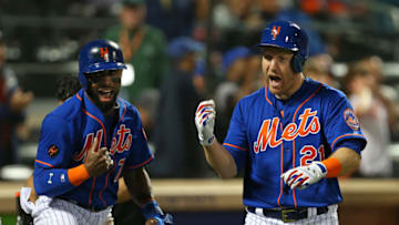 NEW YORK, NY - JUNE 10: Todd Frazier #21 of the New York Mets celebrates with Jose Reyes #7 after he hit a two-run home run during the fifth inning against the New York Yankees during a game at Citi Field on June 10, 2018 in the Flushing neighborhood of the Queens borough of New York City. (Photo by Rich Schultz/Getty Images)