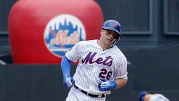 NEW YORK, NY - JUNE 24: Kevin Plawecki #26 of the New York Mets runs the bases after his eighth inning three run home run against the Los Angeles Dodgers at Citi Field on June 24, 2018 in the Flushing neighborhood of the Queens borough of New York City. (Photo by Jim McIsaac/Getty Images)