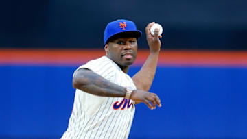 NEW YORK, NY - MAY 27: Rap artist 50 Cent throws the ceremonial first pitch of a game between the New York Mets and the Pittsburgh Pirates at Citi Field on May 27, 2014 in the Flushing neighborhood of the Queens borough of New York City. (Photo by Jim McIsaac/Getty Images)