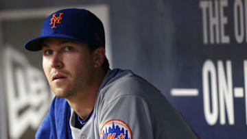 ATLANTA, GA - APRIL 21: Pitcher Jacob watches the action from the dugout in the fourth inning during the game against the Atlanta Braves at SunTrust Park on April 21, 2018 in Atlanta, Georgia. (Photo by Mike Zarrilli/Getty Images)