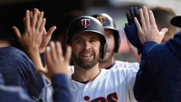 MINNEAPOLIS, MN - MAY 21: Brian Dozier #2 of the Minnesota Twins celebrates scoring a run against the Detroit Tigers during the fifth inning of the game on May 21, 2018 at Target Field in Minneapolis, Minnesota. The Twins defeated the Tigers 4-2. (Photo by Hannah Foslien/Getty Images)