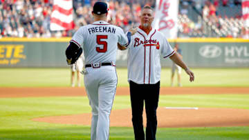 ATLANTA, GEORGIA - OCTOBER 03: Former Atlanta Braves player Chipper Jones shakes hands with Freddie Freeman #5 of the Atlanta Braves after throwing out the ceremonial first pitch prior to game one of the National League Division Series between the Atlanta Braves and the St. Louis Cardinals at SunTrust Park on October 03, 2019 in Atlanta, Georgia. (Photo by Todd Kirkland/Getty Images)