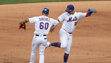 NEW YORK, NEW YORK - JULY 24: Pete Alonso #20 and Andres Gimenez #60 of the New York Mets celebrate a 1-0 win against the Atlanta Bravesduring Opening Day at Citi Field on July 24, 2020 in New York City. The 2020 season had been postponed since March due to the COVID-19 pandemic. (Photo by Al Bello/Getty Images)