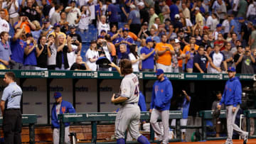 ST PETERSBURG, FL - JUNE 13: Pitcher R.A. Dickey #43 of the New York Mets tips his hat to the crowd after his one hit complete game against the Tampa Bay Rays at Tropicana Field on June 13, 2012 in St. Petersburg, Florida. (Photo by J. Meric/Getty Images)