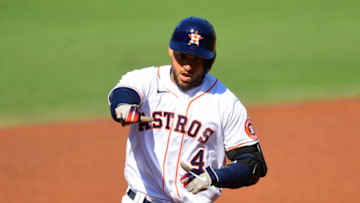 Oct 15, 2020; San Diego, California, USA; Houston Astros center fielder George Springer (4) celebrates after hitting a solo home run against the Tampa Bay Rays in the first inning during game five of the 2020 ALCS at Petco Park. Mandatory Credit: Jayne Kamin-Oncea-USA TODAY Sports