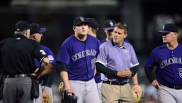 Apr 27, 2015; Phoenix, AZ, USA; Colorado Rockies starting pitcher Tyler Matzek (15) leaves the game during the sixth inning against the Arizona Diamondbacks at Chase Field. Mandatory Credit: Joe Camporeale-USA TODAY Sports