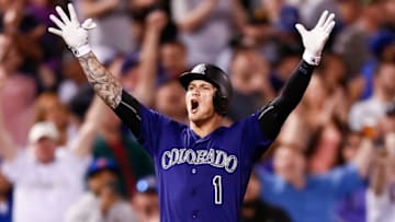 Apr 22, 2016; Denver, CO, USA; Colorado Rockies center fielder Brandon Barnes (1) celebrates after hitting a two RBI triple in the eighth inning against the Los Angeles Dodgers at Coors Field. Mandatory Credit: Isaiah J. Downing-USA TODAY Sports