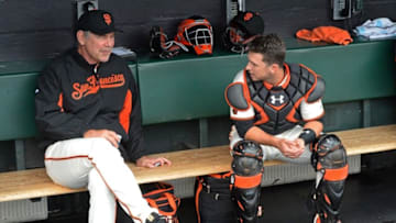 Apr 9, 2016; San Francisco, CA, USA; San Francisco Giants manager Bruce Bochy (15) and catcher Buster Posey (28) talk in the dugout before the baseball game against the Los Angeles Dodgers at AT&T Park. Mandatory Credit: Kenny Karst-USA TODAY Sports