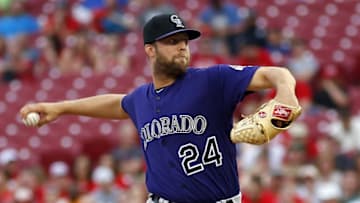 Apr 18, 2016; Cincinnati, OH, USA; Colorado Rockies starting pitcher Jordan Lyles throws against the Cincinnati Reds during the second inning at Great American Ball Park. Mandatory Credit: David Kohl-USA TODAY Sports