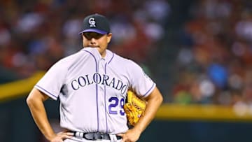 Apr 4, 2016; Phoenix, AZ, USA; Colorado Rockies pitcher Jorge De La Rosa reacts in the fifth inning against the Arizona Diamondbacks during Opening Day at Chase Field. Mandatory Credit: Mark J. Rebilas-USA TODAY Sports