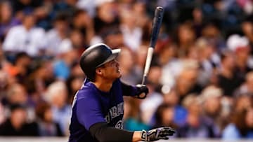 Apr 13, 2016; Denver, CO, USA; Colorado Rockies third baseman Nolan Arenado (28) watches his ball after hitting a two run home run in the third inning against the San Francisco Giants at Coors Field. Mandatory Credit: Isaiah J. Downing-USA TODAY Sports