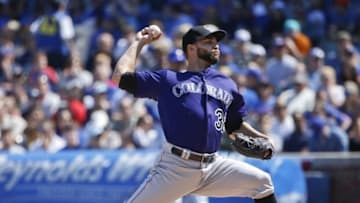 Apr 17, 2016; Chicago, IL, USA; Colorado Rockies starting pitcher Tyler Chatwood (32) delivers a pitch during the first inning against the Chicago Cubs at Wrigley Field. Mandatory Credit: Kamil Krzaczynski-USA TODAY Sports