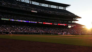 Jun 1, 2015; Denver, CO, USA; General wide view of a fifth inning sunset at Coors Field during the game between the Los Angeles Dodgers against the Colorado Rockies at Coors Field. Mandatory Credit: Ron Chenoy-USA TODAY Sports