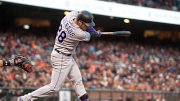 May 6, 2016; San Francisco, CA, USA; Colorado Rockies third baseman Nolan Arenado (28) hits a double during the second inning of the game against the San Francisco Giants at AT&T Park. Mandatory Credit: Ed Szczepanski-USA TODAY Sports