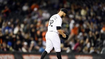 Apr 12, 2016; Denver, CO, USA; Colorado Rockies starting pitcher Tyler Chatwood (32) walks back to the mound after giving up a two run home run to San Francisco Giants catcher Trevor Brown (not pictured) in the fifth inning at Coors Field. Mandatory Credit: Ron Chenoy-USA TODAY Sports