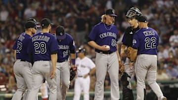 May 26, 2016; Boston, MA, USA; Colorado Rockies manager Walt Weiss (22) makes his way to the mound to take out starting pitcher Jon Gray (55) as they take on the Boston Red Sox in the eighth inning at Fenway Park. Mandatory Credit: David Butler II-USA TODAY Sports