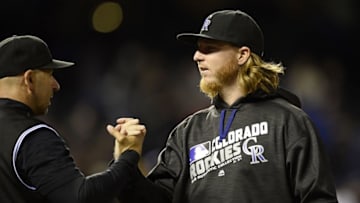 May 13, 2016; Denver, CO, USA; Colorado Rockies starting pitcher Jon Gray (55) and manager Walt Weiss (22) celebrate the win over the New York Mets at Coors Field. The Rockies defeated the Mets 5-2. Mandatory Credit: Ron Chenoy-USA TODAY Sports