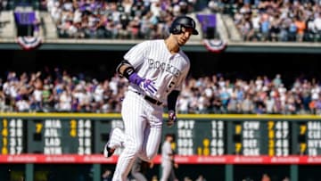 May 28, 2016; Denver, CO, USA; Colorado Rockies right fielder Carlos Gonzalez (5) rounds the bases after hitting a two run home run in the seventh inning against the San Francisco Giants at Coors Field. Mandatory Credit: Isaiah J. Downing-USA TODAY Sports